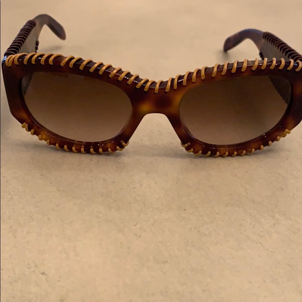 Authentic Burberry sunglasses with Authentic case.